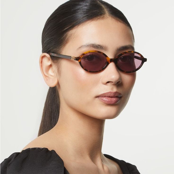 Miu Miu Oval Sunglasses