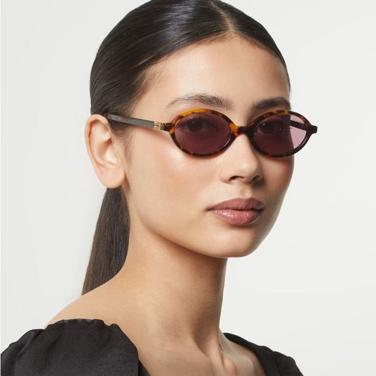 Miu Miu Oval Sunglasses