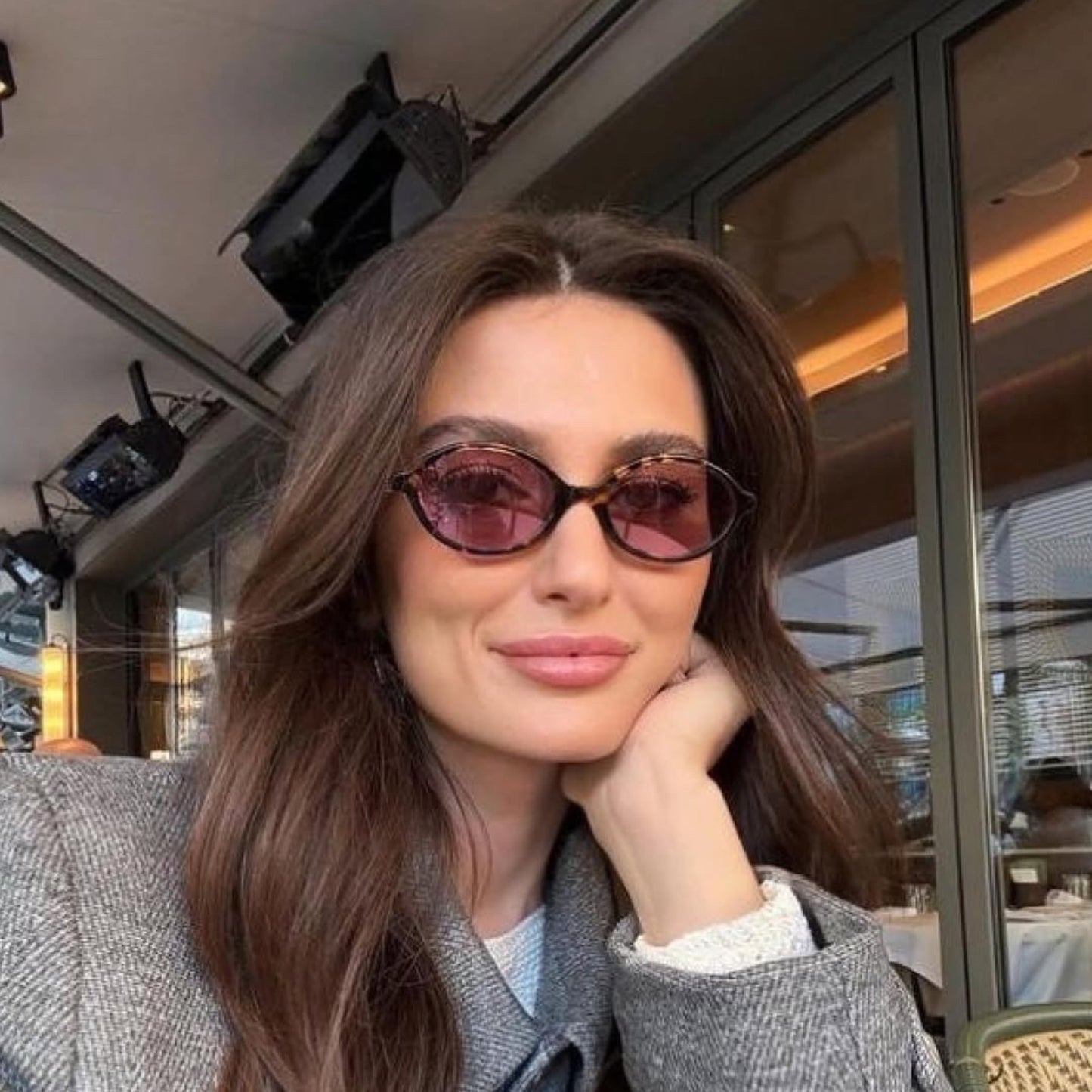 Miu Miu Oval Sunglasses