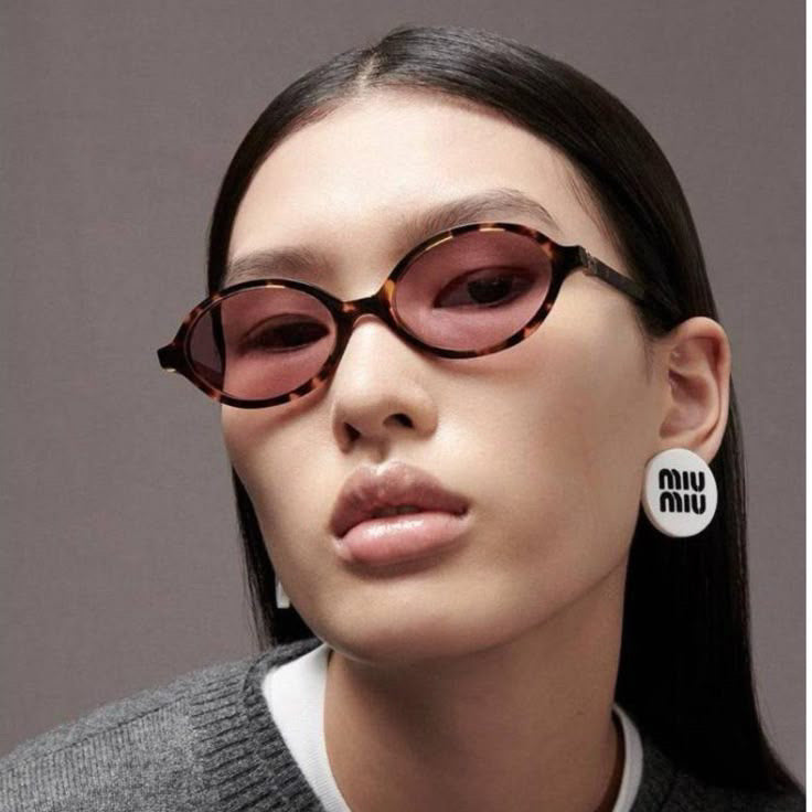 Miu Miu Oval Sunglasses