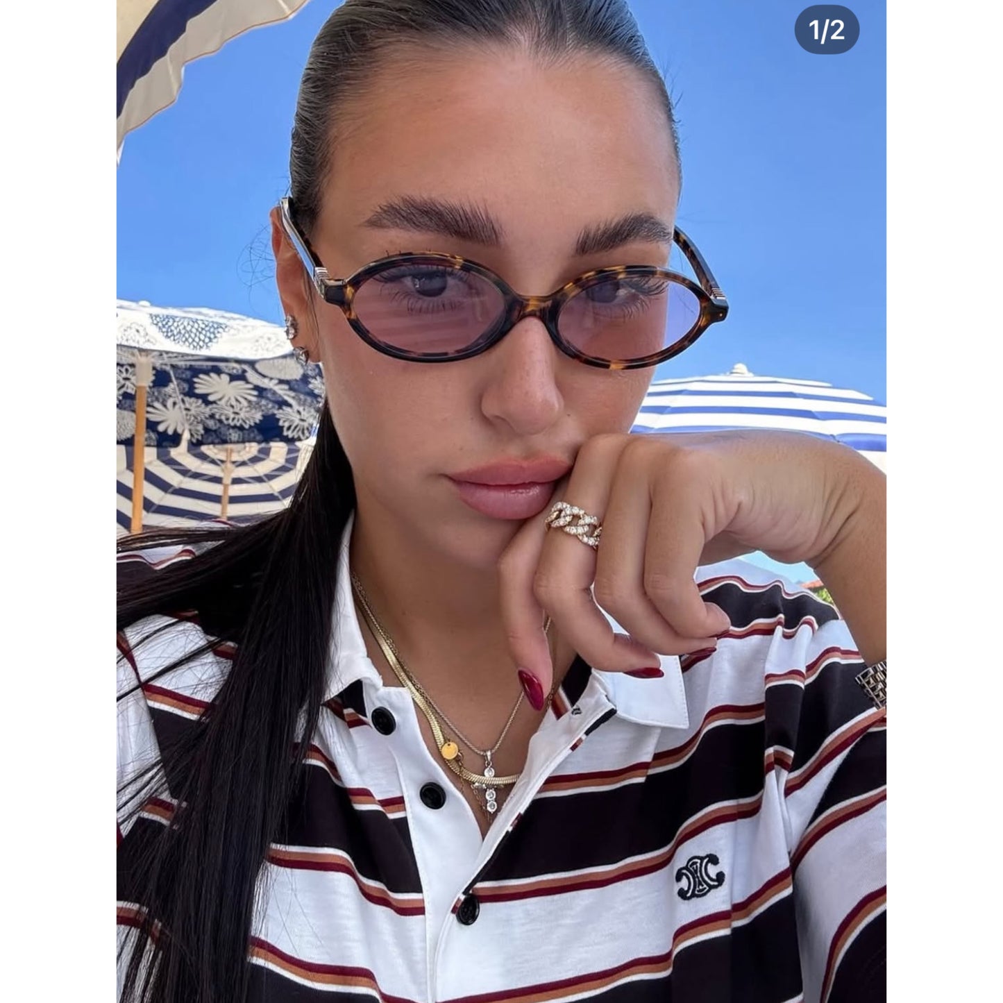 Miu Miu Oval Sunglasses