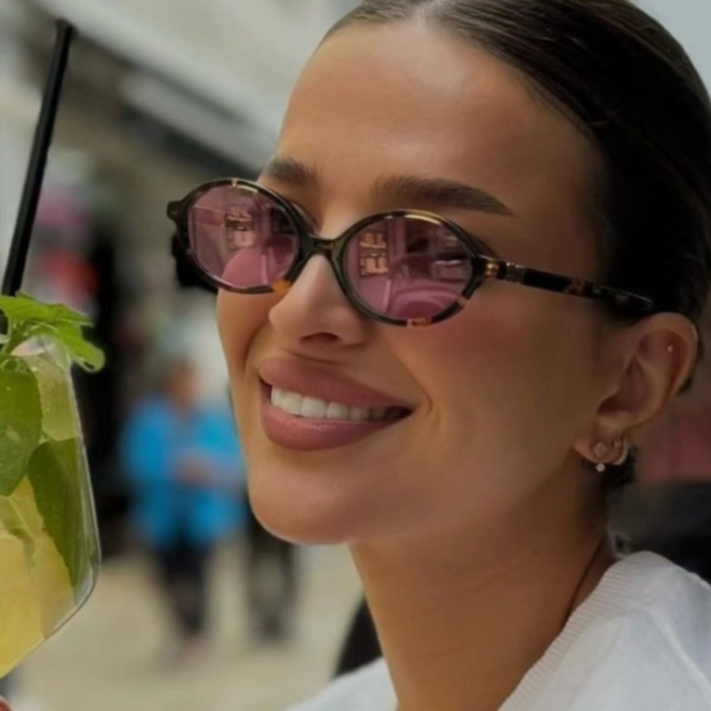 Miu Miu Oval Sunglasses