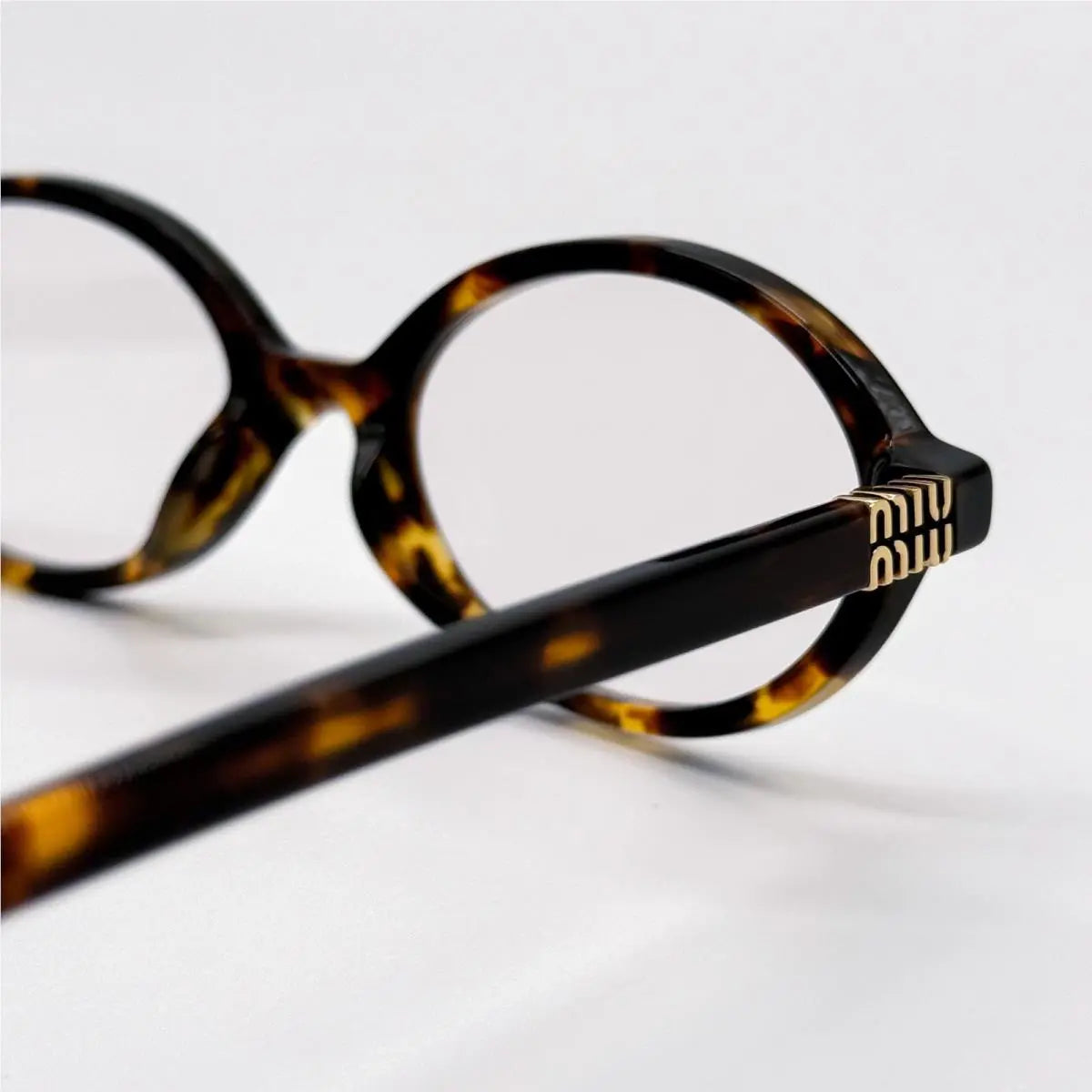Miu Miu Regard Glasses
